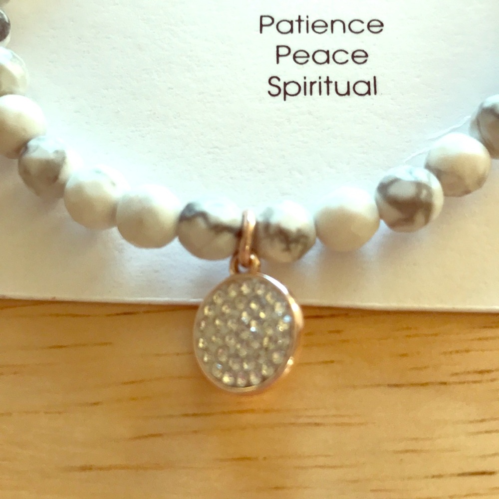 White & gray beads  on copper colored bracelet